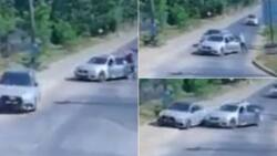 Video shows Audi driver narrowly evading hijackers by showing zero hesitation and speeding off