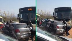 Nelspruit men lift VW Polo to clear bus path, netizens react: "I've seen this a lot"