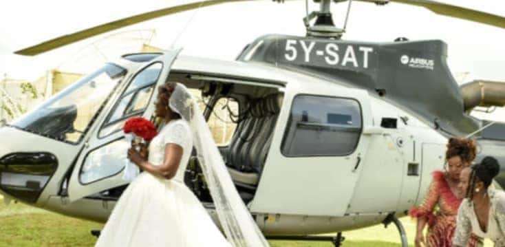 Happy wife remembers hiring chopper for her colouraful white wedding