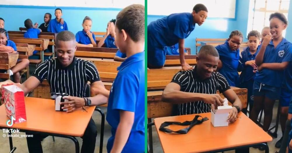 A teacher unwrapped his gift in front of learners