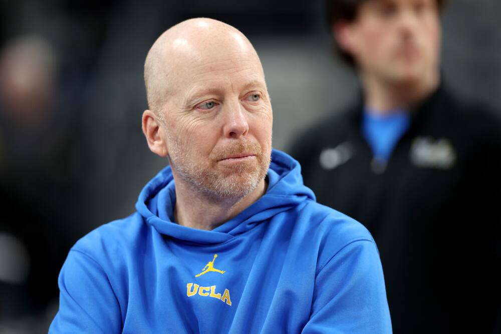 Mick Cronin of the UCLA Bruins looks on during practice at T-Mobile Arena