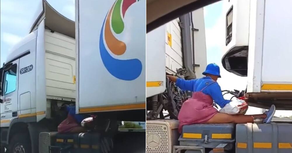 Woman hitching ride on truck