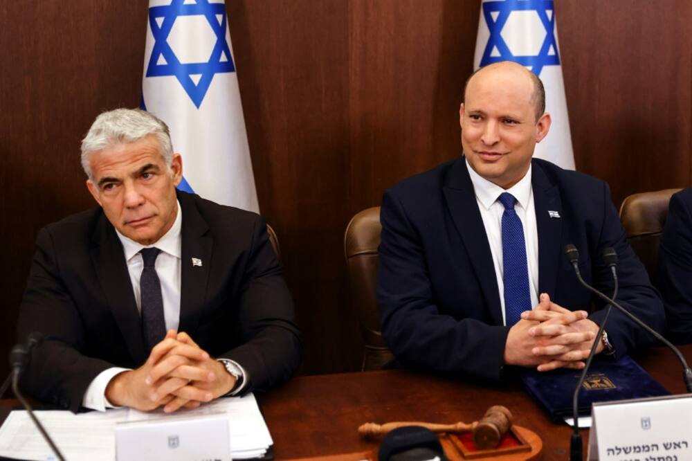 Israeli Prime Minister Naftali Bennett is expected to hand over power to Foreign Minister Yair Lapid after parliament dissolves itself
