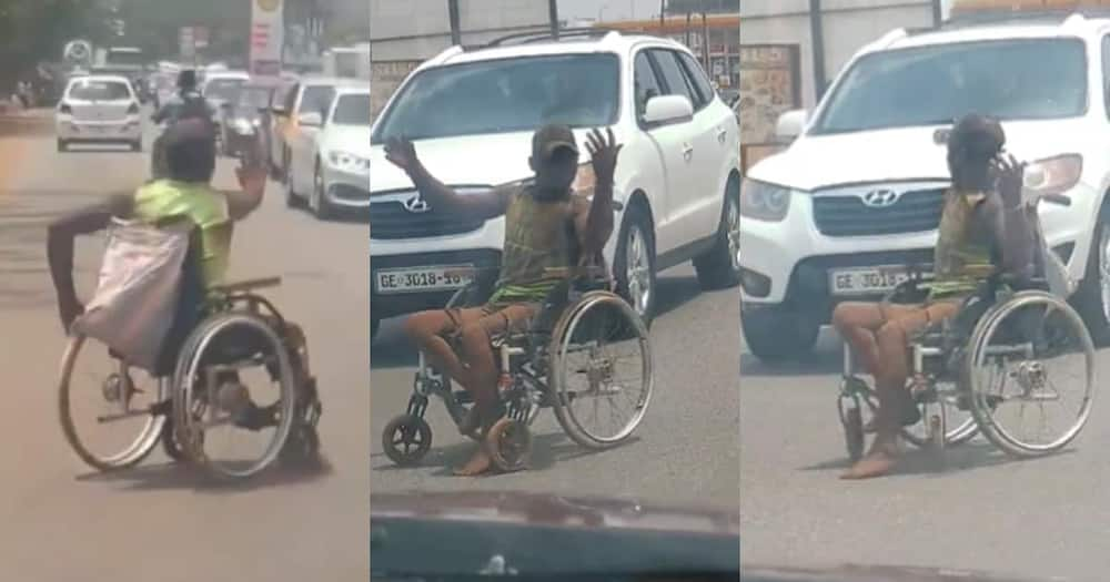 Ghanaian disabled man directing traffic in Accra