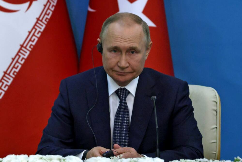 Russian President Vladimir Putin looks on during a joint press conference with his Iranian and Turkish counterparts following their summit in Tehran