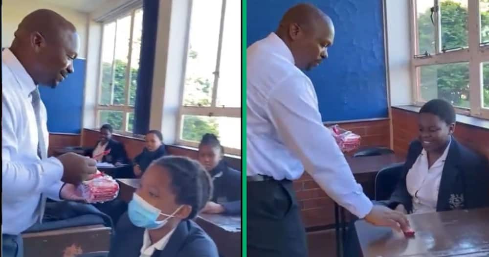Teacher gives pupils chocolate