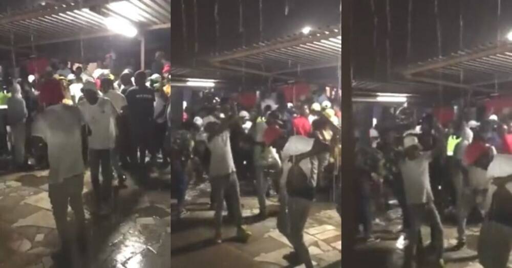 People dancing, dancing, dance, rain, dancing in rain, groove, Mzansi, South Africa, viral video, trending video, Twitter video