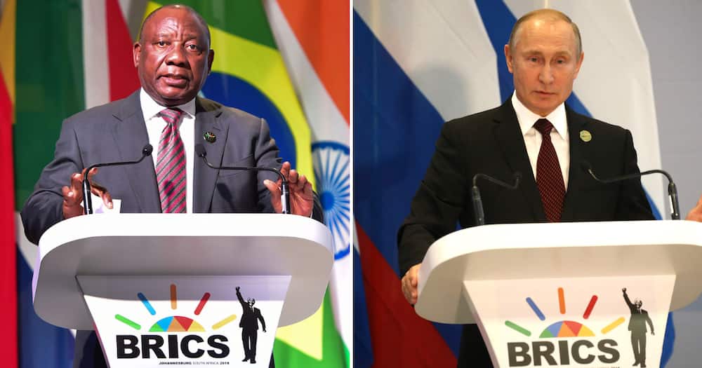 South African President Cyril Ramaphosa and Russian President Vladimir Putin behind the Brics Summit podium