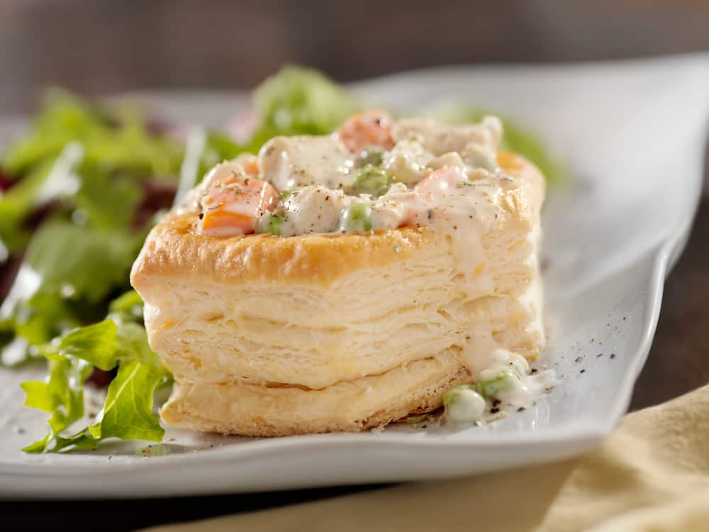 Chicken a la king in puff a pastry shell.