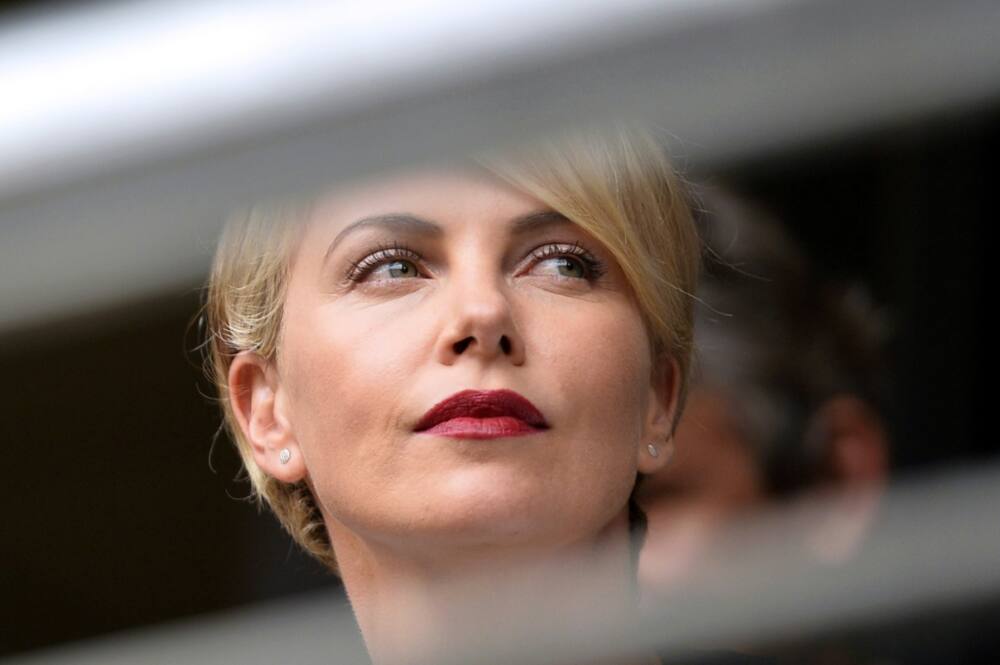Language storm: Charlize Theron, pictured here at the funeral of Nelson Mandela in December 2013