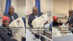 President Cyril Ramaphosa shares heart-warming moment with new mom in hospital, holds 1 day old baby