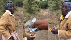 BI Phakathi leaves gogo speechless, shares emotional clip after blessing her with money