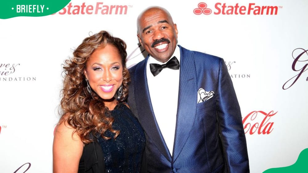 Who was Marjorie Harvey married to before?