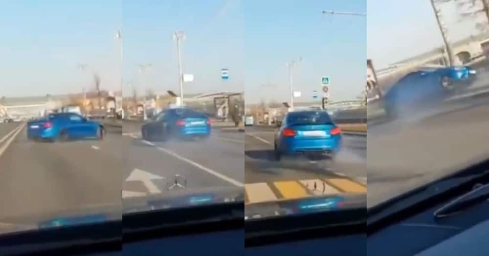 Motorist, BMW, crash, trying to drag race, video goes viral