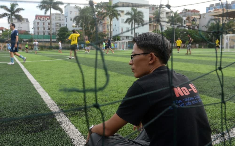 Rights activist Nguyen Lan Thang, pictured here at a football pitch in 2017, was arrested in Hanoi on Tuesday