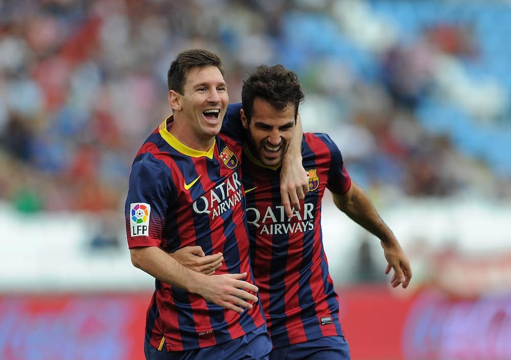 Cesc Fabregas and Messi