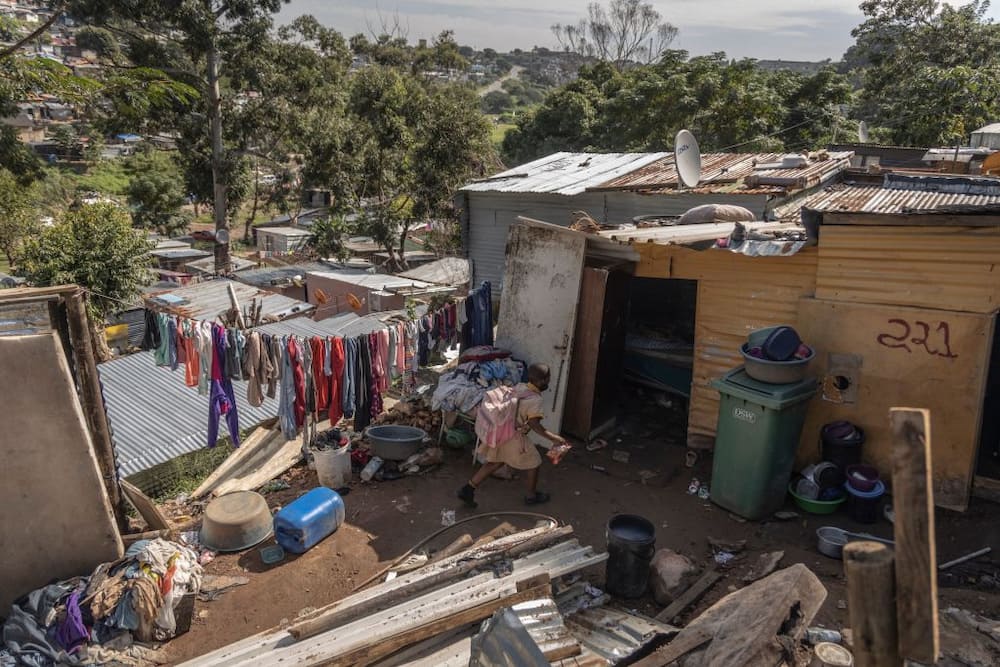 Five people, including a shop owner, were gunned down in an informal settlement in Durban