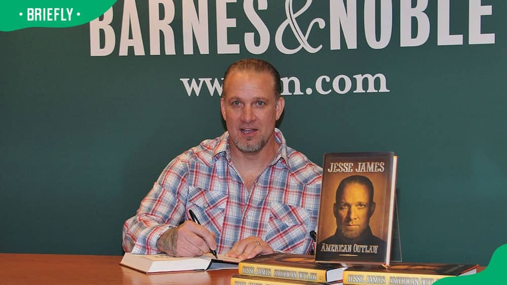 TV personality Jesse James signing copies of American Outlaw in 2011