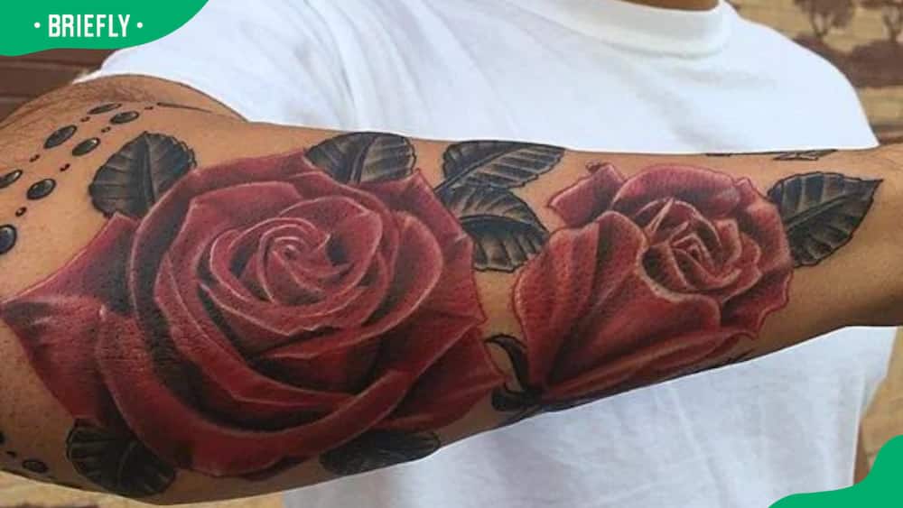 Deep red rose tattoo
