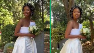 Woman rocks afro on wedding day in TikTok video, Mzansi applauds her elegant look