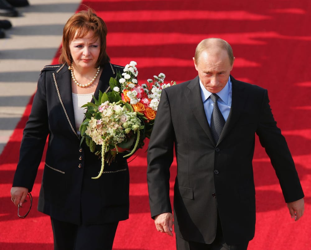 Putin and And Ocheretnaya at a previous G8 Summit. 
Source: Andreas Rentz/Getty Images.