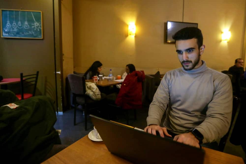 Website developer Muhammad Sabahi is among those who rely on cafes to work