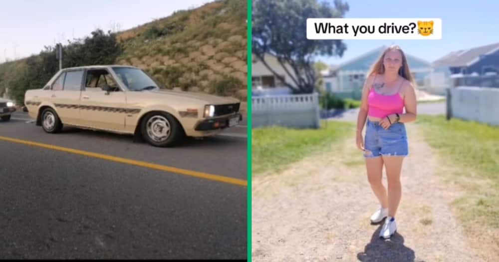 woman shows off her old school Toyota