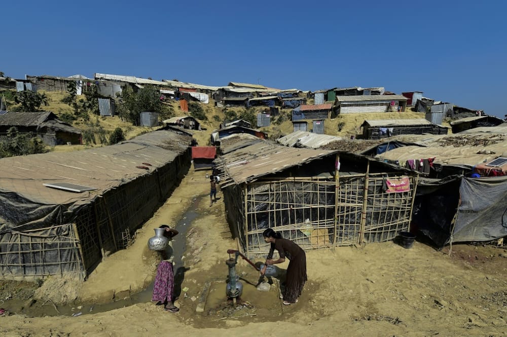 Rohingya Muslim refugees collect water at Thankhali refugee camp in Bangladesh's Ukhia district in 2018