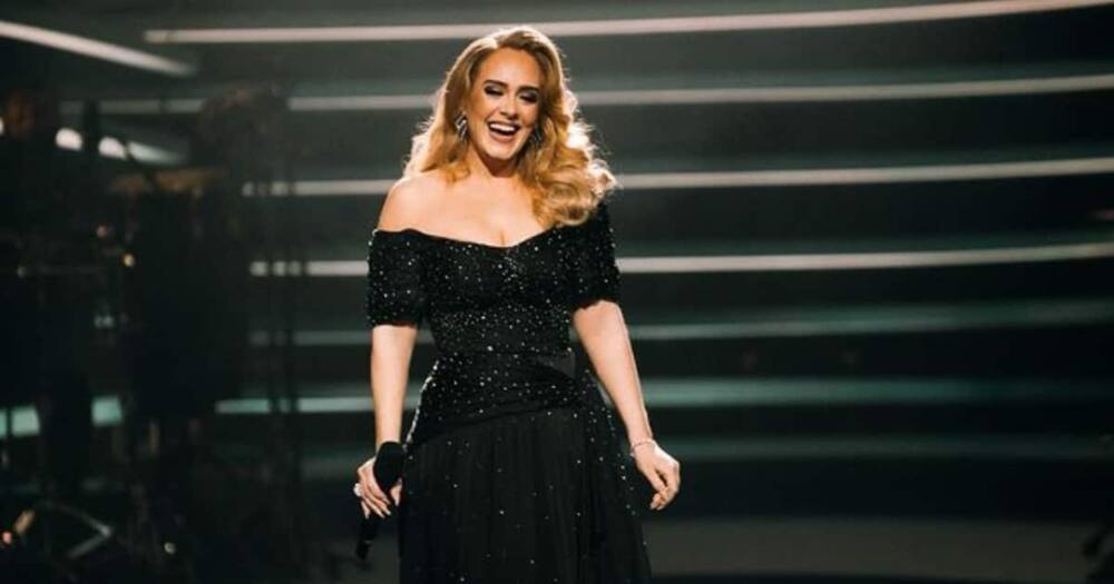 Adele showers former teacher with praise not knowing she's in the audience.