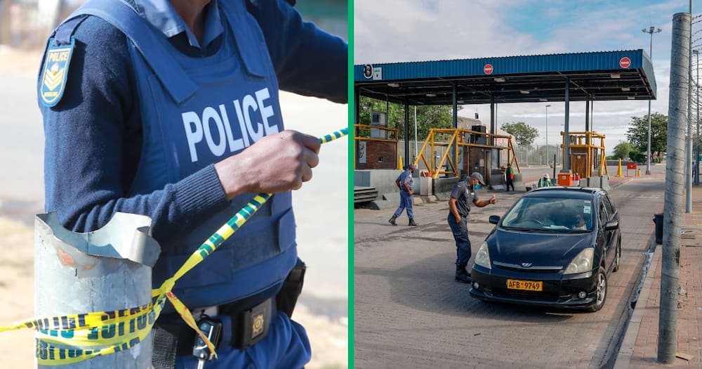 A South African Police Service (SAPS) officer interacts with a driver who's crossing from Zimbabwe into South Africa using the Beitbridge border post, near Musina