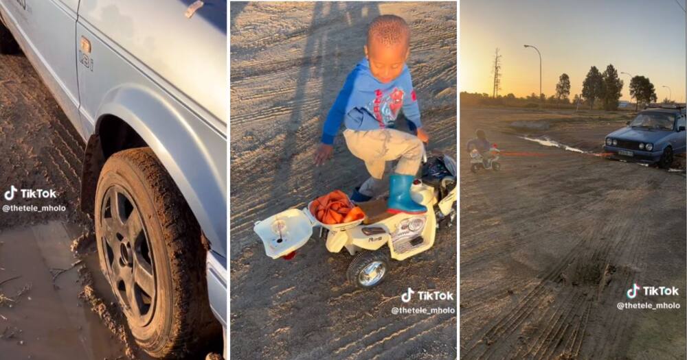 Dad gets his son to tow him out of the mud using toy bike
