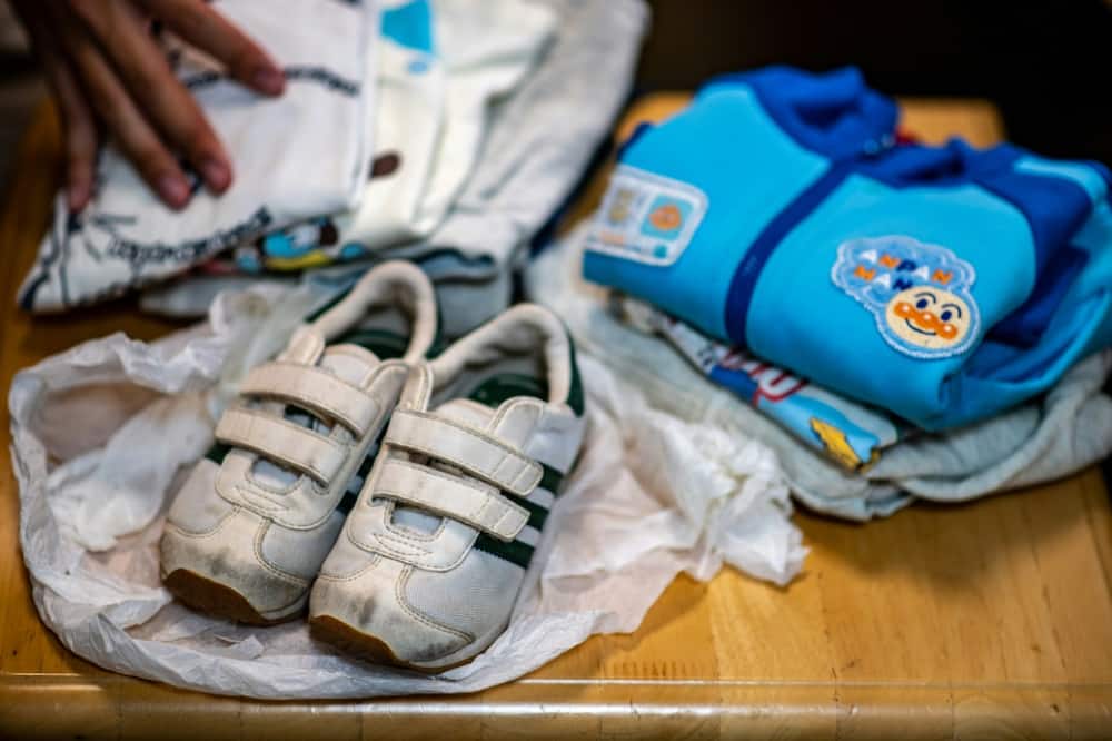 The clothes he was wearing when he was abandoned as a toddler are the 'oldest memories I have of my childhood', says 18-year-old Kiochi Miyatsu