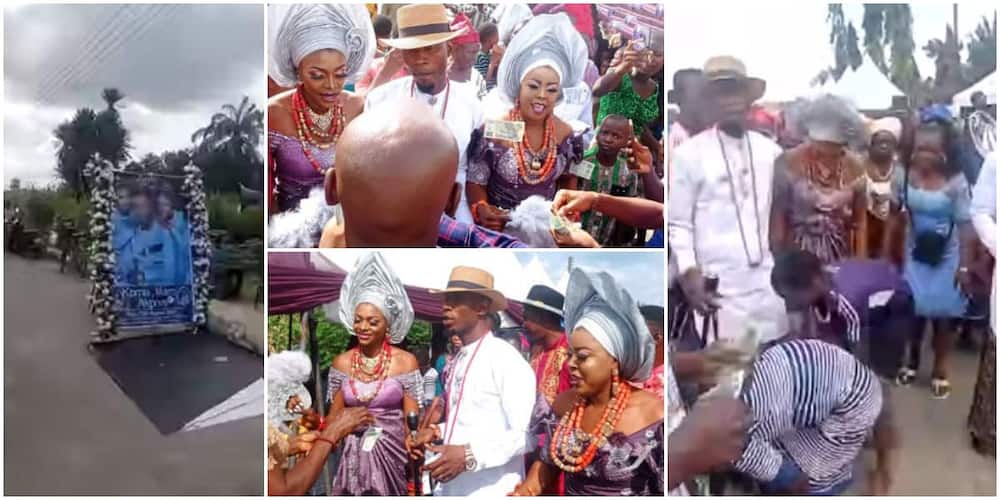 Reactions as 34-year-old Nigerian man and his two brides are sprayed with cash at their wedding