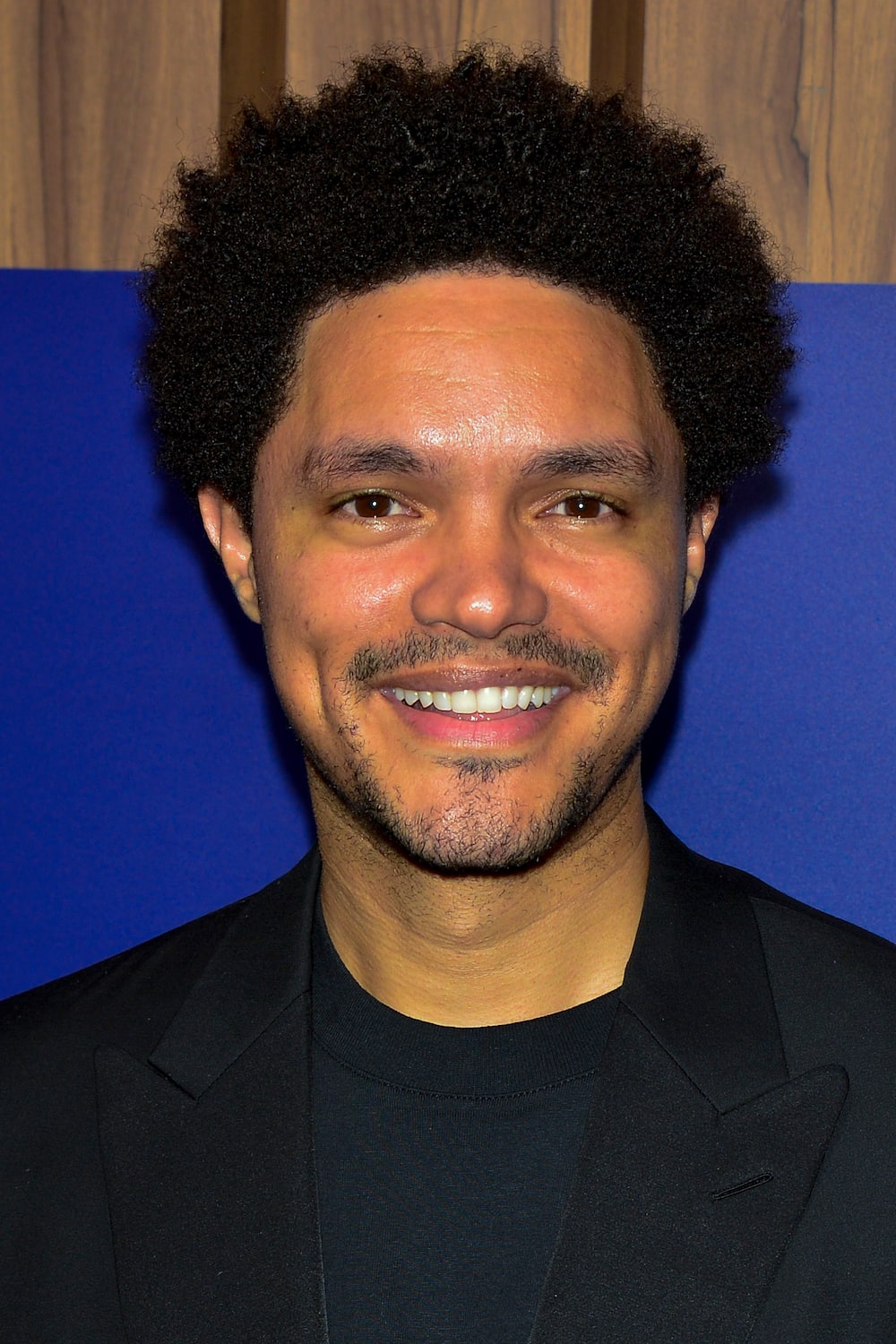 What does Trevor Noah's father do?