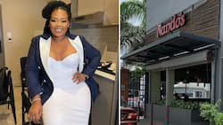 Anele claps back at Nando's for making fun of dirty coin between her teeth, SA cheers