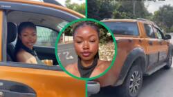 Independent young woman thanks dad for teaching her how to drive manual car, shows skills in Ford Ranger