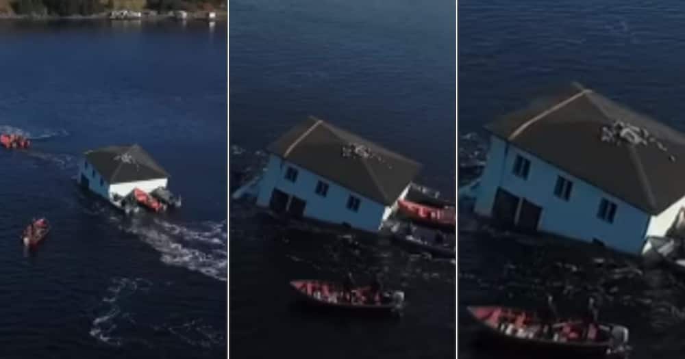 World Wowed, by Candian Couple, Who Moved Entire, House Across the Island