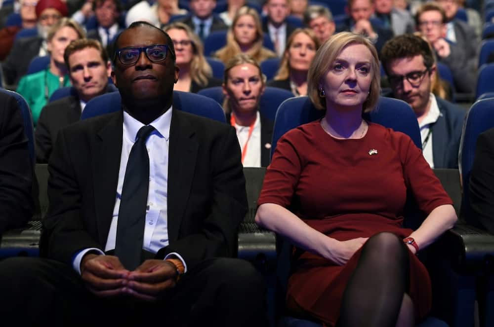 Britain's finance minister Kwasi Kwarteng (L) and Prime Minister Liz Truss have come under fire over their debt-fueled mini-budget