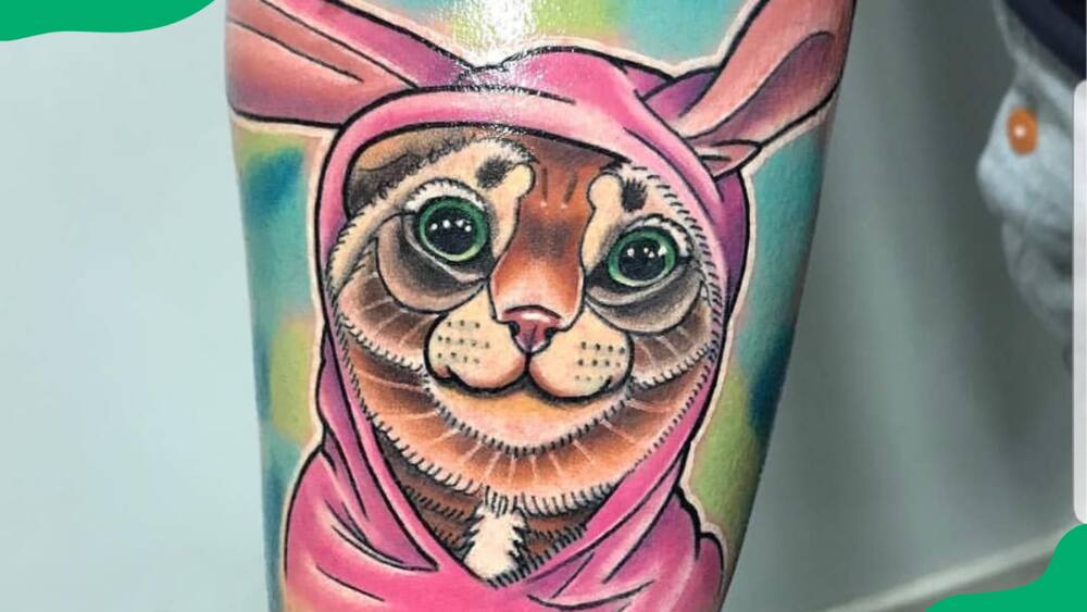 The Illusion cat tattoo