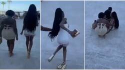Shapely lady in thick heels trips and falls flat, opens legs in video; many react with emotions
