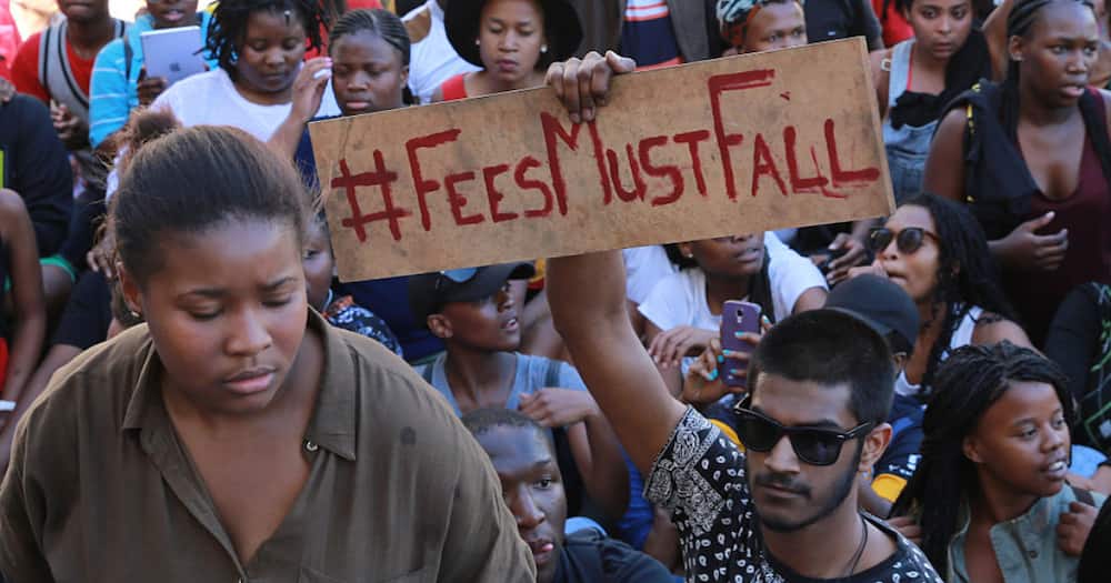 Students protest high cost of tertiary education during #FeesMustFall protests of 2015.