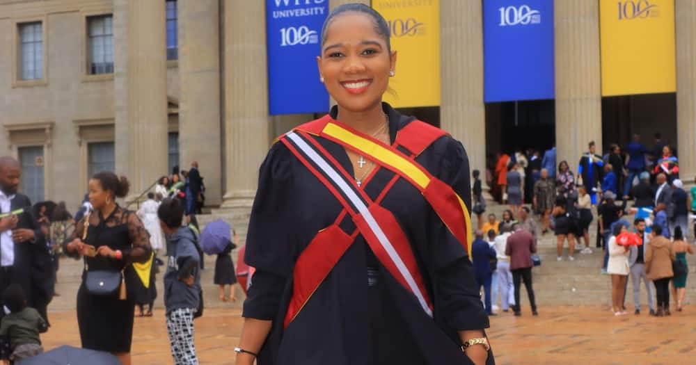 The lady is proud to be a master's graduate from the University of the Witwatersrand