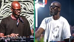DJ Black Coffee spotted on stage with beautiful model Hellen França, SA can't get enough