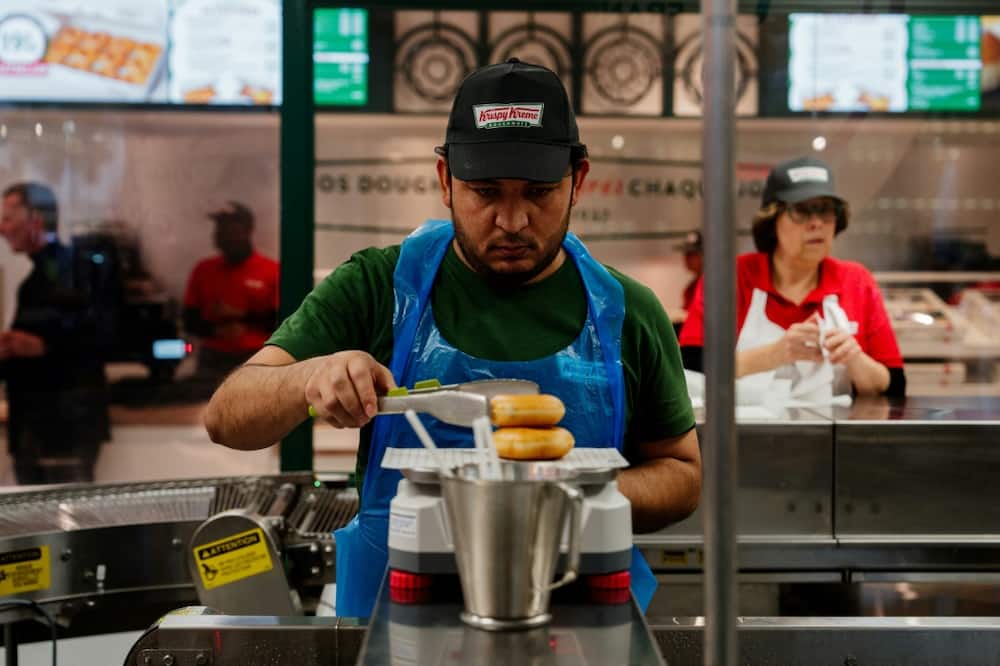 Krispy Kreme has opened its first shop in Paris and is aiming for 500 nationwide within five years