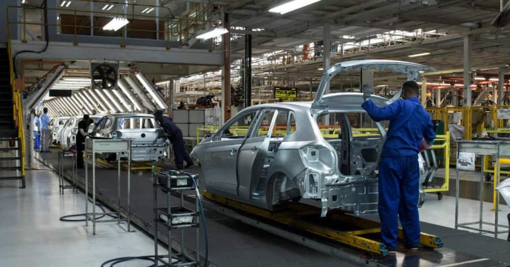 Employees worked on manufacturing a car at a Volkswagen plant.
