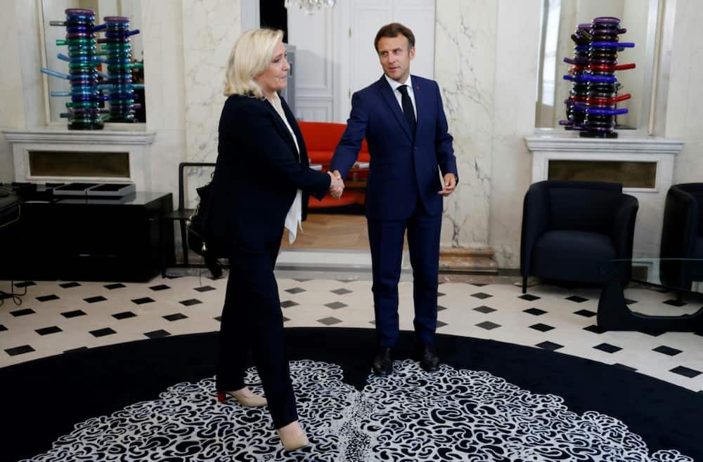 French President Emmanuel Macron is hosting rare talks at the Elysee with opposition leaders, including far-right leader Marine Le Pen