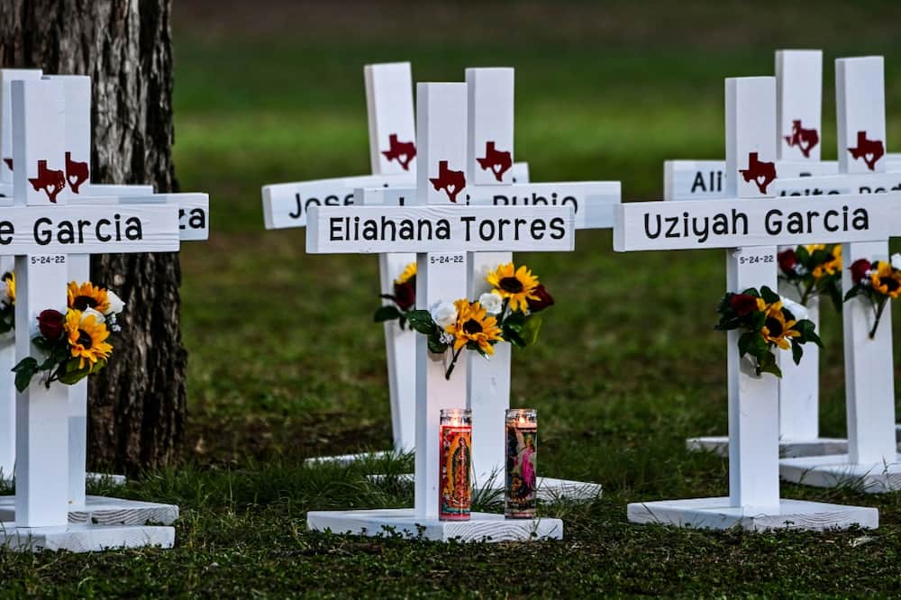 Crosses adorn a makeshift memorial for the shooting victims at Robb Elementary School in Uvalde, Texas, on May 26, 2022