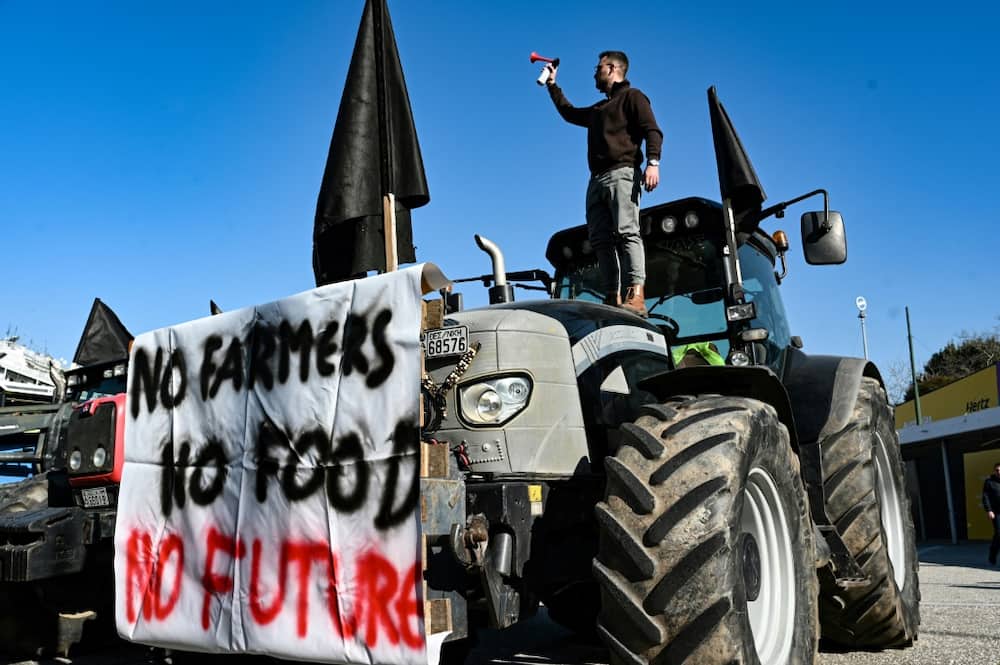 One of the angry farmers who converged on the agricultural fair in Thessaloniki on Thursday