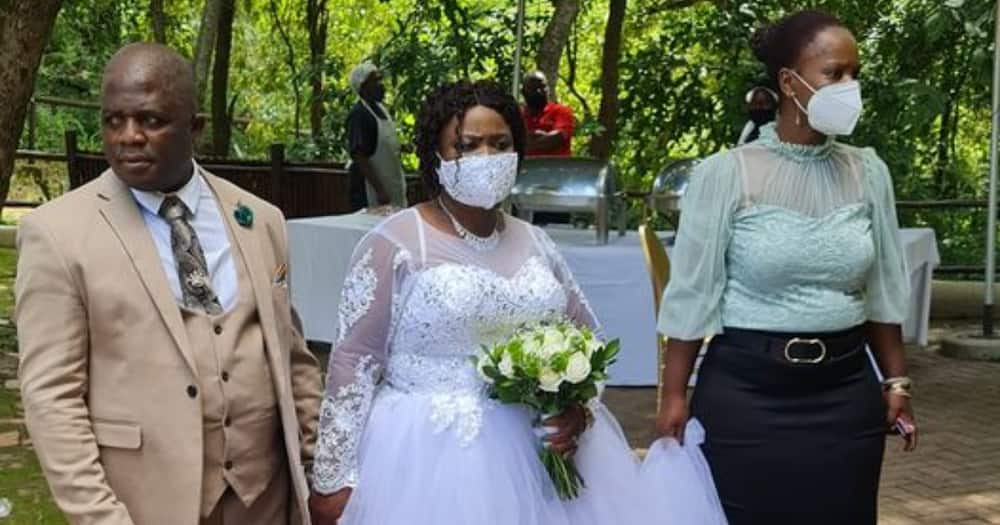 A young lady celebrates her grandparent's vow renewal