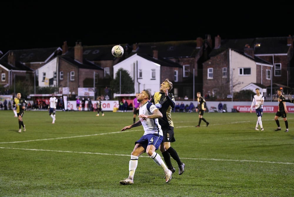 Marine AFC vs Tottenham's players in action in the FA Cup